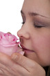 junge Frau riecht sinnlich an einer Rose #2