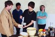 Teenagers Serving A Meal To A Man