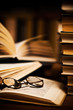 opened book, lying on the bookshelf