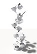 Skyscraper of tea cups and spoons