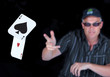 Man playing Poker with Winning Aces