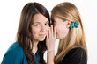 Girlfriends whisper a secret