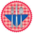 Spoon, fork and knife on table cloth