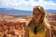 Young woman in front of the Bryce Canyon in Utah.