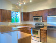 Modern kitchen with stainless steel appliances Modern kitchen with stainless steel appliances