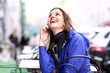 Happy young lady talking on mobile phone Happy young lady talking on mobile phone