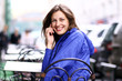 Happy young lady talking on mobile phone Happy young lady talking on mobile phone