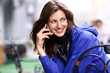 Happy young lady talking on mobile phone Happy young lady talking on mobile phone