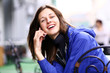 Happy young lady talking on mobile phone Happy young lady talking on mobile phone