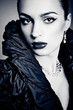 Beautiful fashion girl on the grey background Beautiful fashion girl on the grey background
