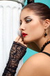 Portrait of beautiful fashion girl on the turquoise background Portrait of beautiful fashion girl on the turquoise background