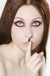 Beautiful woman in silence gesture Beautiful woman in silence gesture