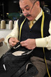Traditional tailor working at studio Traditional tailor working at studio