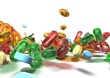 Close up of colorful pills over a white background