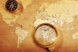 compass on a Treasure map background ,with Magnifier compass on a Treasure map background ,with Magnifier
