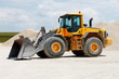 Yellow Excavator at Construction Site