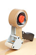 Packaging tape dispenser and shipping box Packaging tape dispenser and shipping box