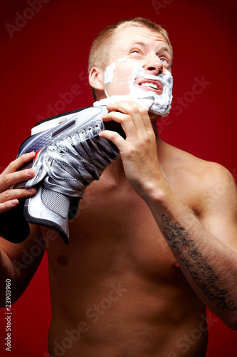 Photo: Man shaving Man shaving