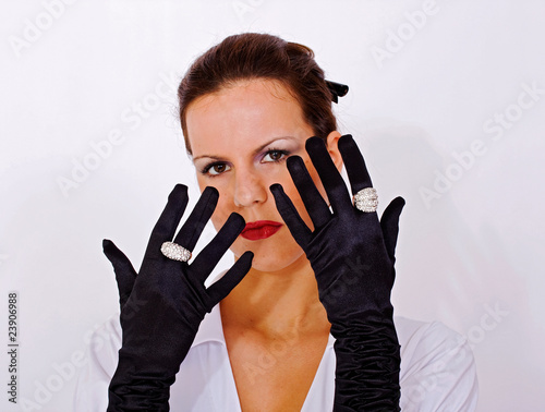 Photo: Girl with black satin gloves and rings Girl with black satin gloves and rings
