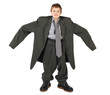 little boy in big grey man's suit and boots nads at sides
