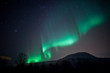 Aurora Borealis curtains rippling in the sky