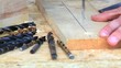 Professional carpenter using power drill closeup Professional carpenter using power drill closeup
