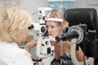 doctor,examining a patient in ophthalmology laboratory
