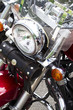 Motorbike's chromed engine. Bikes in a street