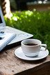 coffee and paper note in garden
