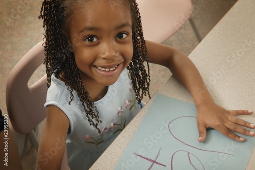 Photo: Girl Colors A Picture Girl Colors A Picture