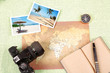 A pile of clutter items on green background A pile of clutter items on green background