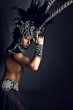 Young man in ritual suit of pagan priest.