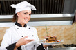 pretty chef presenting steak
