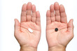 On the one hand, white pill, on the other black On the one hand, white pill, on the other black