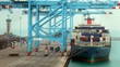Loading of cargoes on the cargo ship. Time lapse