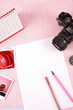 Clutter of objects stacked on pink background Clutter of objects stacked on pink background