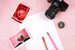 Clutter of objects stacked on pink background Clutter of objects stacked on pink background
