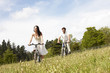 Couple riding bikes