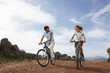 Couple riding bikes