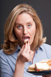 Woman eating a sandwich