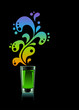 Glass of absinthe on black background.