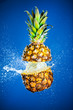 Pineapple splashed with water