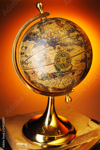 Photo: Antique globe on books Antique globe on books