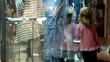 girl walking along museum display window with exhibits