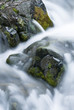 Close up of blurred water rushing in stream