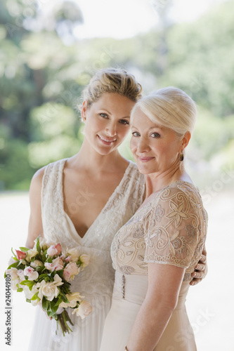 Photo: Mother and bride hugging Mother and bride hugging