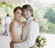 Bride and groom hugging
