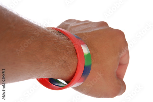 Photo: Charity wristbands on wrist cutout Charity wristbands on wrist cutout