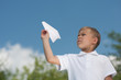 Boy with paper plane