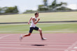 Runner sprinting on track